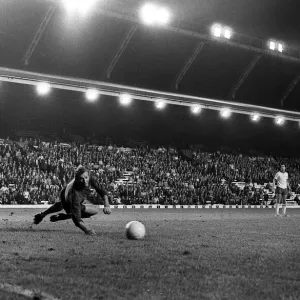 Brian Kidd scores for Manchester United past Bob Wilson of Arsenal at Anfield Brian Kidd scores for Manchester United past Bob Wilson of Arsenal at Anfield