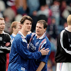 Brian Laudrup and Paul Gascoigne Rangers football players celebrate after their Scottish