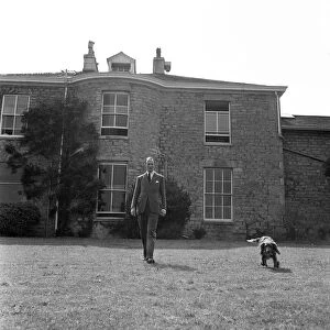 Brigadier Fitzroy Maclean at home with his dog Fury, in Yealand Conyers, Lancashire. 1949