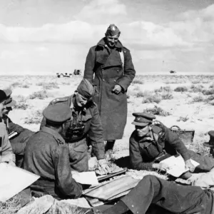 A Brigadier and other officers hold a conference in the Western Desert during the British A Brigadier and other officers hold a conference in the Western Desert during the British