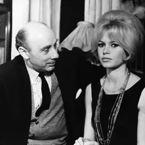 Brigitte Bardot actress and Donald Zec Daily Mirror writer sitting together Brigitte Bardot actress and Donald Zec Daily Mirror writer sitting together