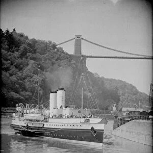 The Bristol Queen paddle steamer seen here closes to the Clifton Suspension Bridge Circa