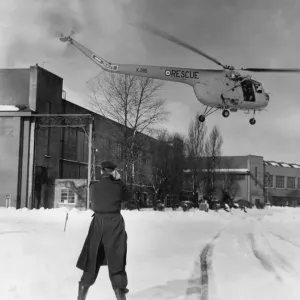 A Bristol Sycamore HR14 helicopter and crew of 275 Search and Rescue Squadron A Bristol Sycamore HR14 helicopter and crew of 275 Search and Rescue Squadron