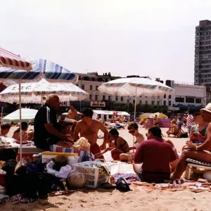 Britain Places : Margate, Kent. Holidaymakers relaxing on the beach at the seaside resort Britain Places : Margate, Kent. Holidaymakers relaxing on the beach at the seaside resort