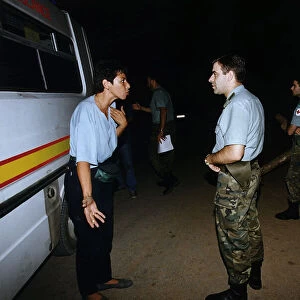 British aid worker Sally Becker argues with a soldier on her mercy drive from Mostar