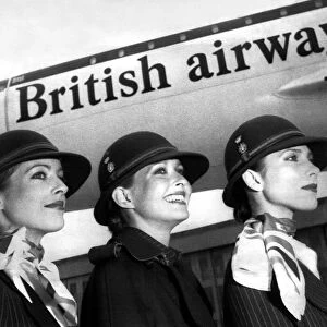 British Airways stewardesses show off a classic and elegant new uniform designed by top
