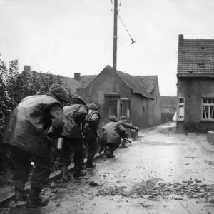 British army counter booby trap patrol soldiers moves off after a mortar bomb fell into