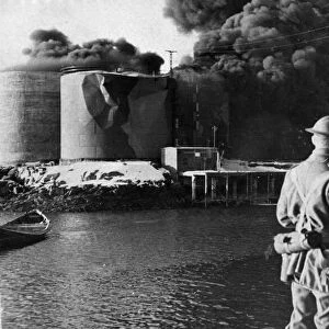British commandos watch fires burning in Stamsund on the Lofoten Island