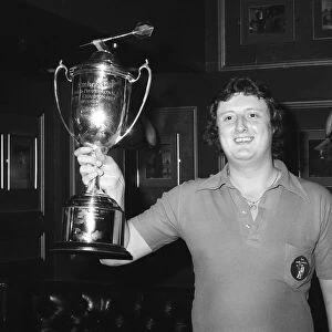 British darts player Eric Bristow celebrates his victory over John Lowe in the Final of