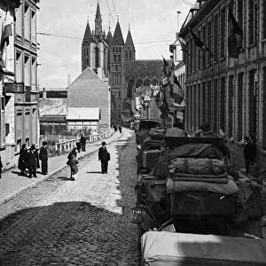 British forces enter Brussels. Greeting first tanks of armour. September 1944