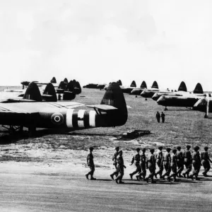 British Glider borne troops march out to board their craft for take off in the first British Glider borne troops march out to board their craft for take off in the first