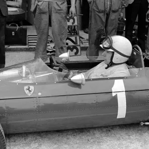 British Grand Prix 1965-John Surtees sits in his Ferrari. July 1965 British Grand Prix 1965-John Surtees sits in his Ferrari. July 1965