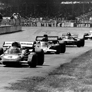 British Grand Prix Silverstone Jacky Ickx in the Ferrari number 4 car leads Emerson