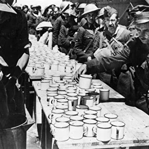 British and Imperial troops return from Greece. Mugs of tea awaited these men