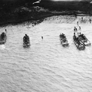 British and Indian troops landing on the banks of the Rangoon River during Second World