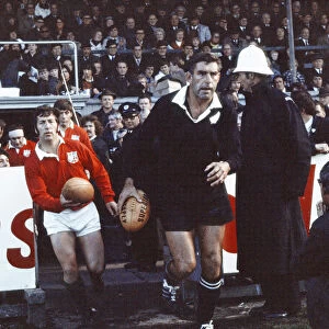 British Lions 9 v. New Zealand 3. John Dawes (l) and Colin Meads lead out their