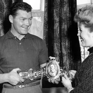 British middleweight champion Mick Leahy hands over his Lonsdale Belt to his wife British middleweight champion Mick Leahy hands over his Lonsdale Belt to his wife