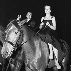 British musician Ronnie Ronalde and Bride Corsie on horseback