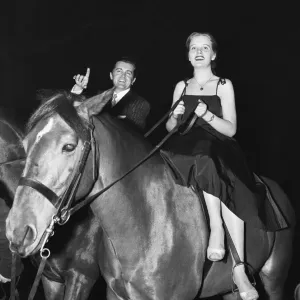 British musician Ronnie Ronalde and Bride Corsie on horseback