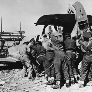 British patrol retrieves a crashed ME 109 in Libya during Second World War British patrol retrieves a crashed ME 109 in Libya during Second World War