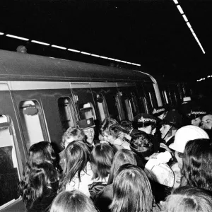 British pop singer David Boowie greeted by crowds of fans at Charing Cross Station