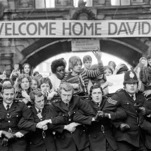 British pop singer David Bowie arrives home at Victoria Station