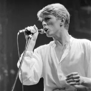 British pop singer David Bowie performing on stage during his concert at Earls court
