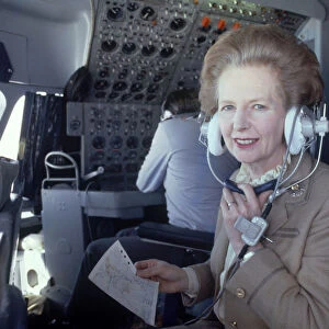 British Prime Minister Margaret Thatcher poses in the cockpit of an RAF Vickers VC10