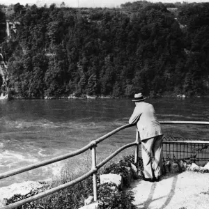 British Prime Minister Winston Churchill admires the view of the Niagara Falls British Prime Minister Winston Churchill admires the view of the Niagara Falls