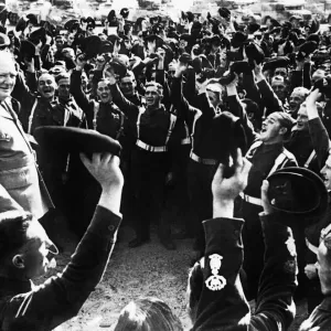British Prime Minister Winston Churchill is cheered by men of the 4th Hussars after his British Prime Minister Winston Churchill is cheered by men of the 4th Hussars after his