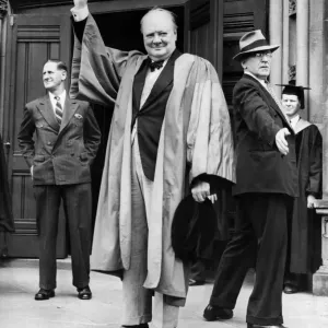 British Prime Minister Winston Churchill gives the famous V Sign in acknowledgement to British Prime Minister Winston Churchill gives the famous V Sign in acknowledgement to