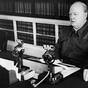 British Prime Minister Winston Churchill making a radio broadcast from Downing Street