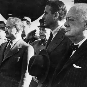 British Prime Minister Winston Churchill stands alongside First Deputy Premier of British Prime Minister Winston Churchill stands alongside First Deputy Premier of
