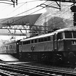 A British Rail express Class 85 electric locomotive train