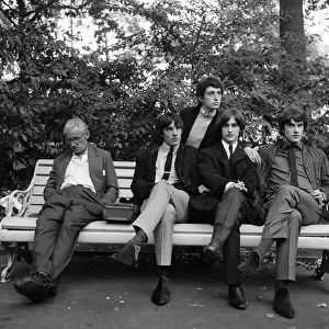British rock group The Kinks pose in the gardens opposite the Flaghouse in Charing Cross