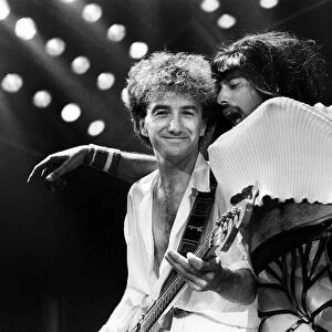 British Rock group Queen in concert at Wembley Arena. Singer Freddie Mercury in