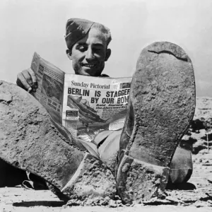 A British soldier reads the Sunday pictorial newspaper in some off-duty leisure time A British soldier reads the Sunday pictorial newspaper in some off-duty leisure time