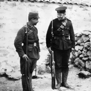 British soldier shows an interested Greek soldier the English way to mount guard British soldier shows an interested Greek soldier the English way to mount guard