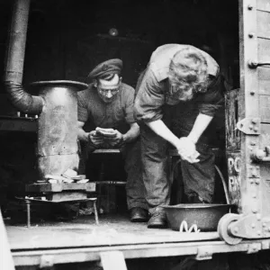 British soldiers in their makeshift home; Sapper Remington spends his spare time in a British soldiers in their makeshift home; Sapper Remington spends his spare time in a