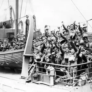 British Soldiers smiling and waving on board a troop ship as they sail to join British Soldiers smiling and waving on board a troop ship as they sail to join