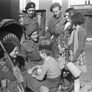 British troops of the 79th in an unknown Normandy town in Northern France a month after British troops of the 79th in an unknown Normandy town in Northern France a month after