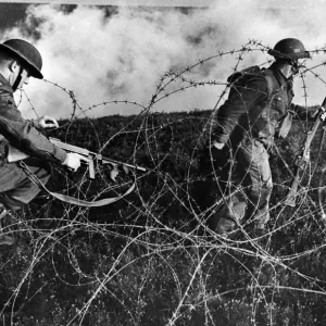 British Troops Advancing Through Barbed Wire Print British Troops Advancing Through Barbed Wire Print