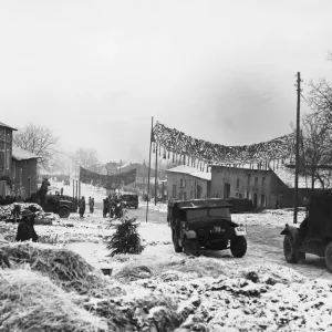 British troops arriving at the French village where they are to be billeted
