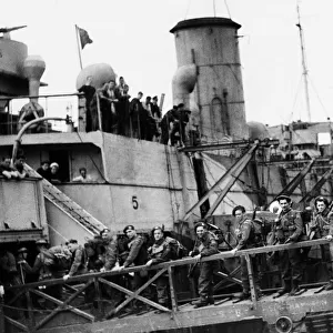 British troops on the gangway going aboard an L. S. I. 7th June 1944