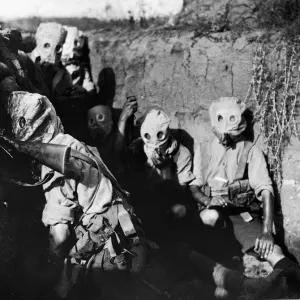 British troops of the Irish 10th Division seen here wearing gas masks in the trenches in