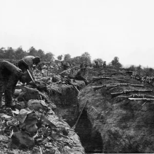 British troops taking the opportunity of a dry spell of weather to lay out their kits to