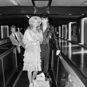 Britt Ekland with boyfriend Jim McDonnell, leaving Heathrow for Los Angeles Britt Ekland with boyfriend Jim McDonnell, leaving Heathrow for Los Angeles