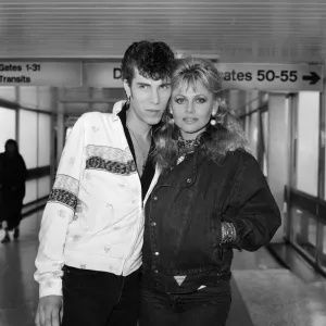 Britt Ekland with boyfriend Slim Jim McDonnell at Heathrow Airport after flying in Britt Ekland with boyfriend Slim Jim McDonnell at Heathrow Airport after flying in