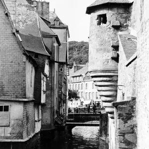 Brittany France. A scene in old Brittany, The ramparts and old house of Quimper