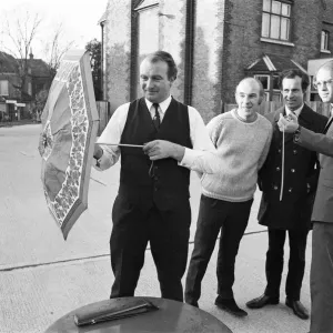 The Brolley Challenger - Jim Carver, of Orpington, taking an umbrella out of a case The Brolley Challenger - Jim Carver, of Orpington, taking an umbrella out of a case